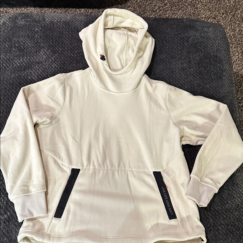 AHG Cream Hooded Sweatshirt with Black Accents. Zipper pockets